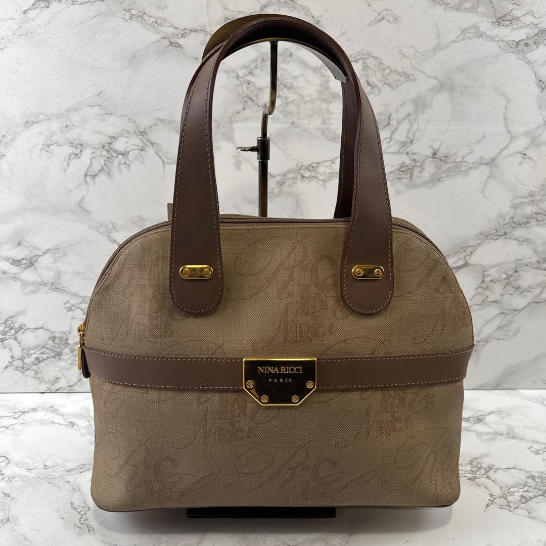 ほぼ未使用品 NINA RICCI ニナリッチ ハーフムーン 総柄 ハンドバッグ — image 2