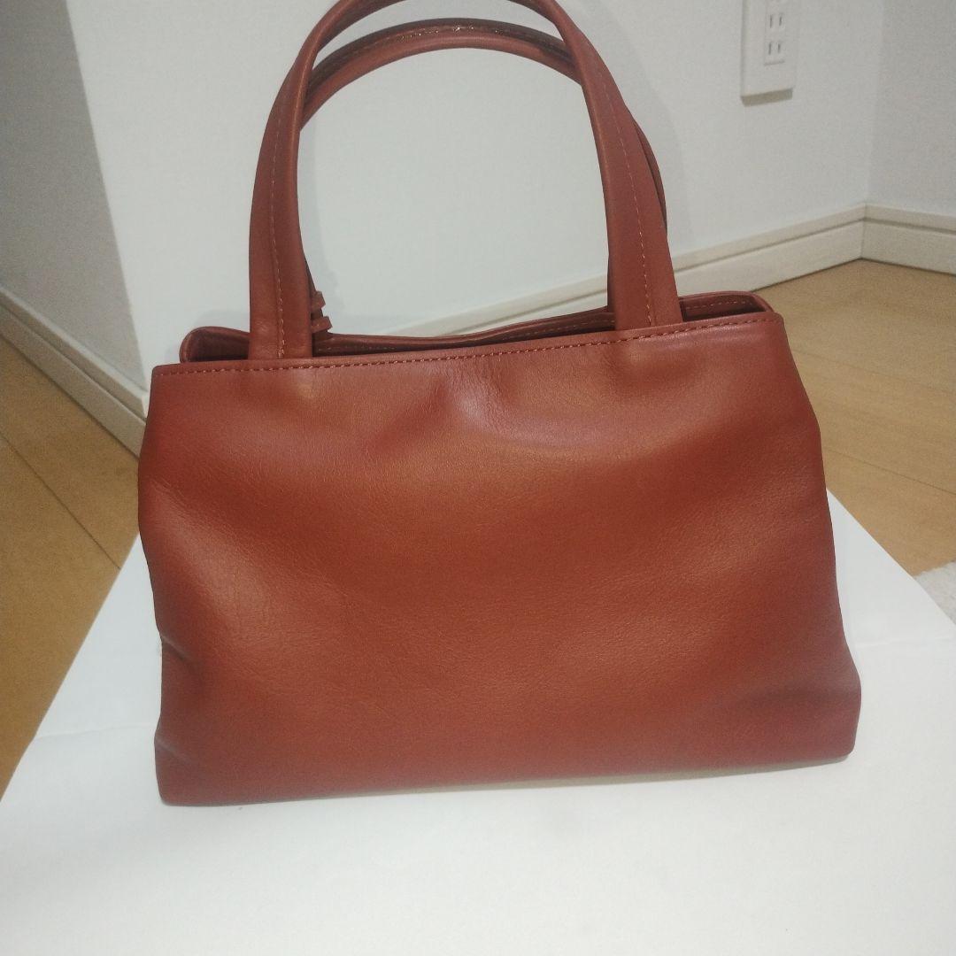 【新品未使用】DAKS LONDON ハンドバッグ タッセル付き　レッド系 — image 2