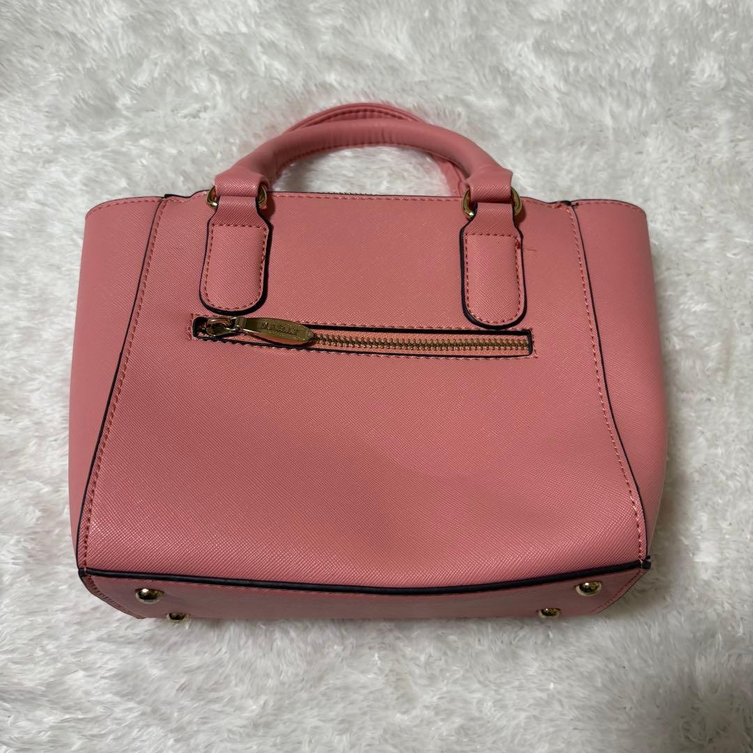 D.KELLY スタッズ付き ピンク ハンドバッグ — image 4