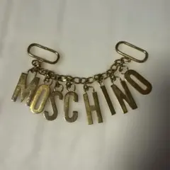 MOSCHINO ロゴチャーム ゴールドカラー — image 1