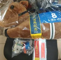 A賞レガレイラ ぬいぐるみ、D賞メジロマックイーンマスコット、F賞タグ — image 1