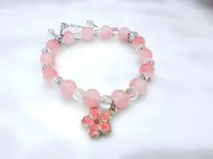 ピンクフラワーチャーム付きビーズブレスレット — image 1