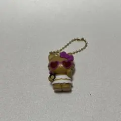 ①サンリオ アロハスイングコレクション キティ ガチャガチャ 日焼け — image 1