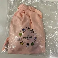 大たまごっち展　ガム入り巾着　コーラルピンク　新品未使用 — image 1